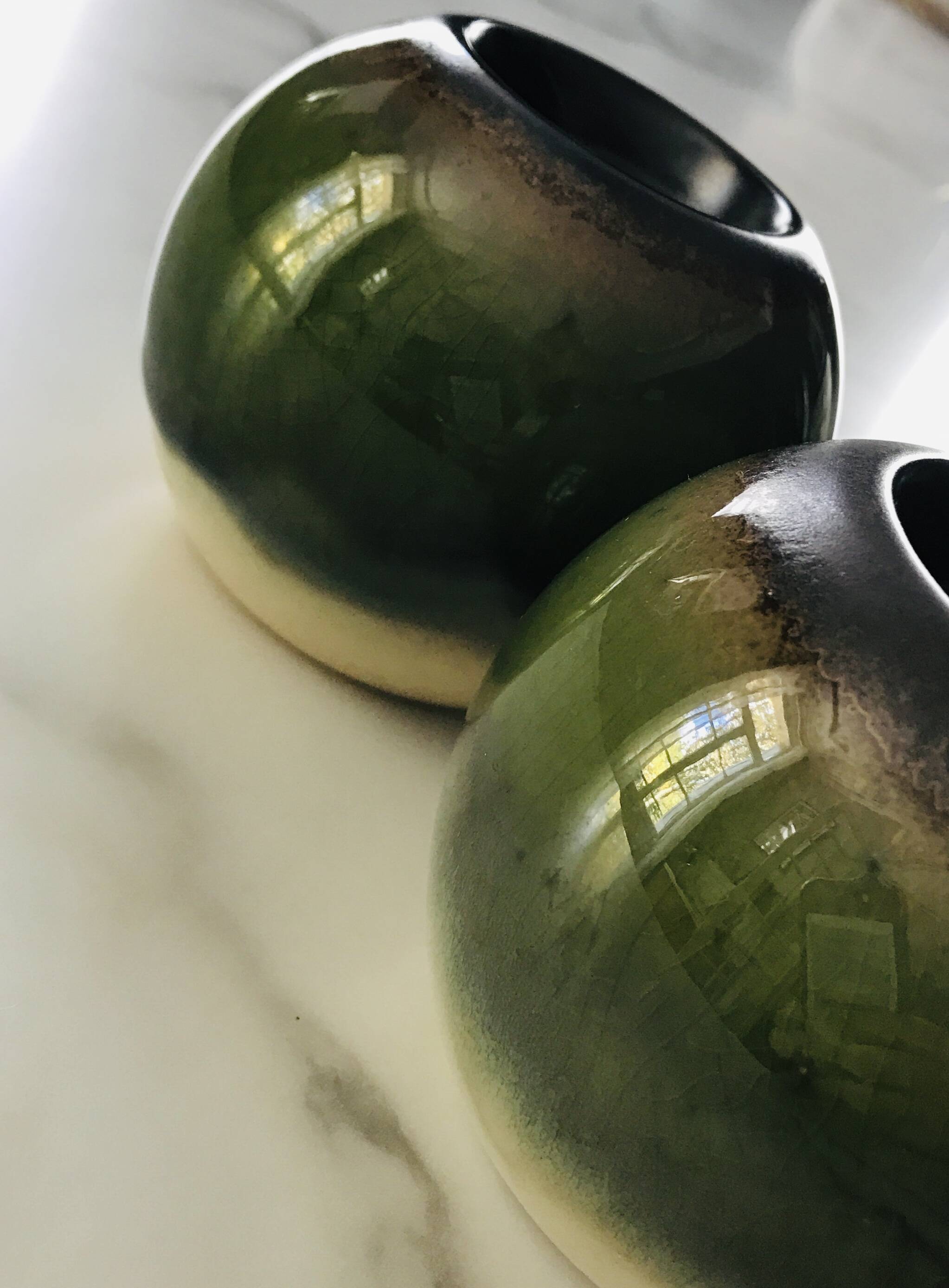 Pair of ceramic ball candlesticks