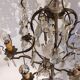 Neoclassical bronze chandelier with 8 lights, tassels and dagger