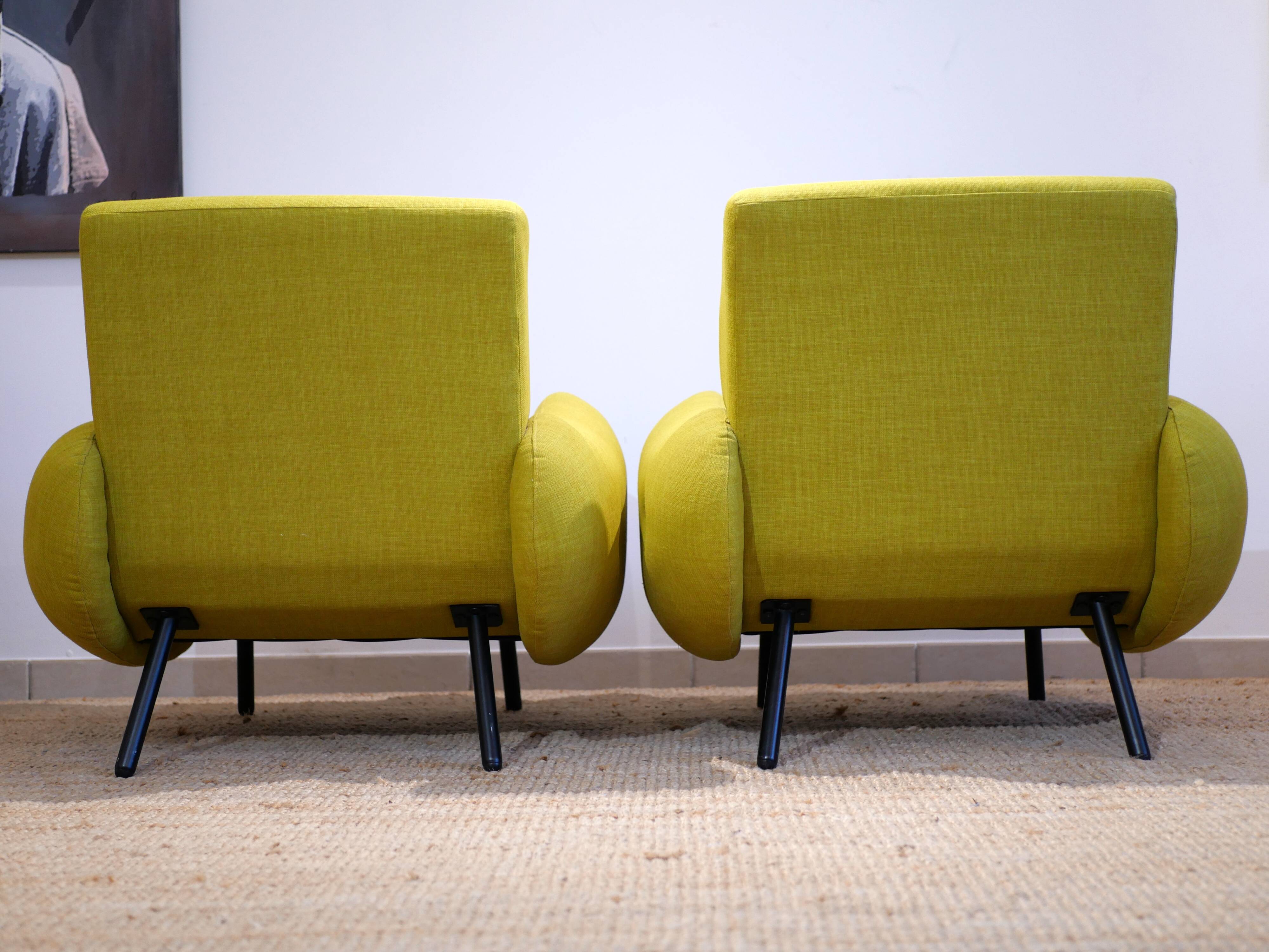 Pair of low armchairs in 60s–70s style