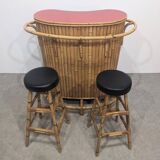 Vintage sixties tiki bar with stools.