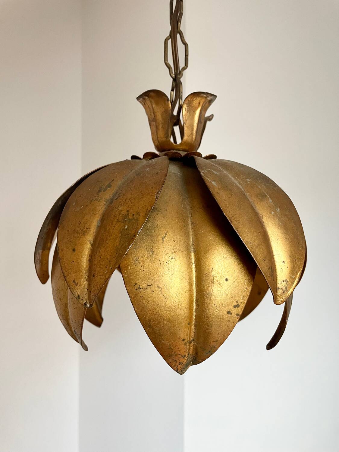 Two vintage pendant lights in gold metal