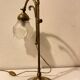 Brass table lamp with a glass shade