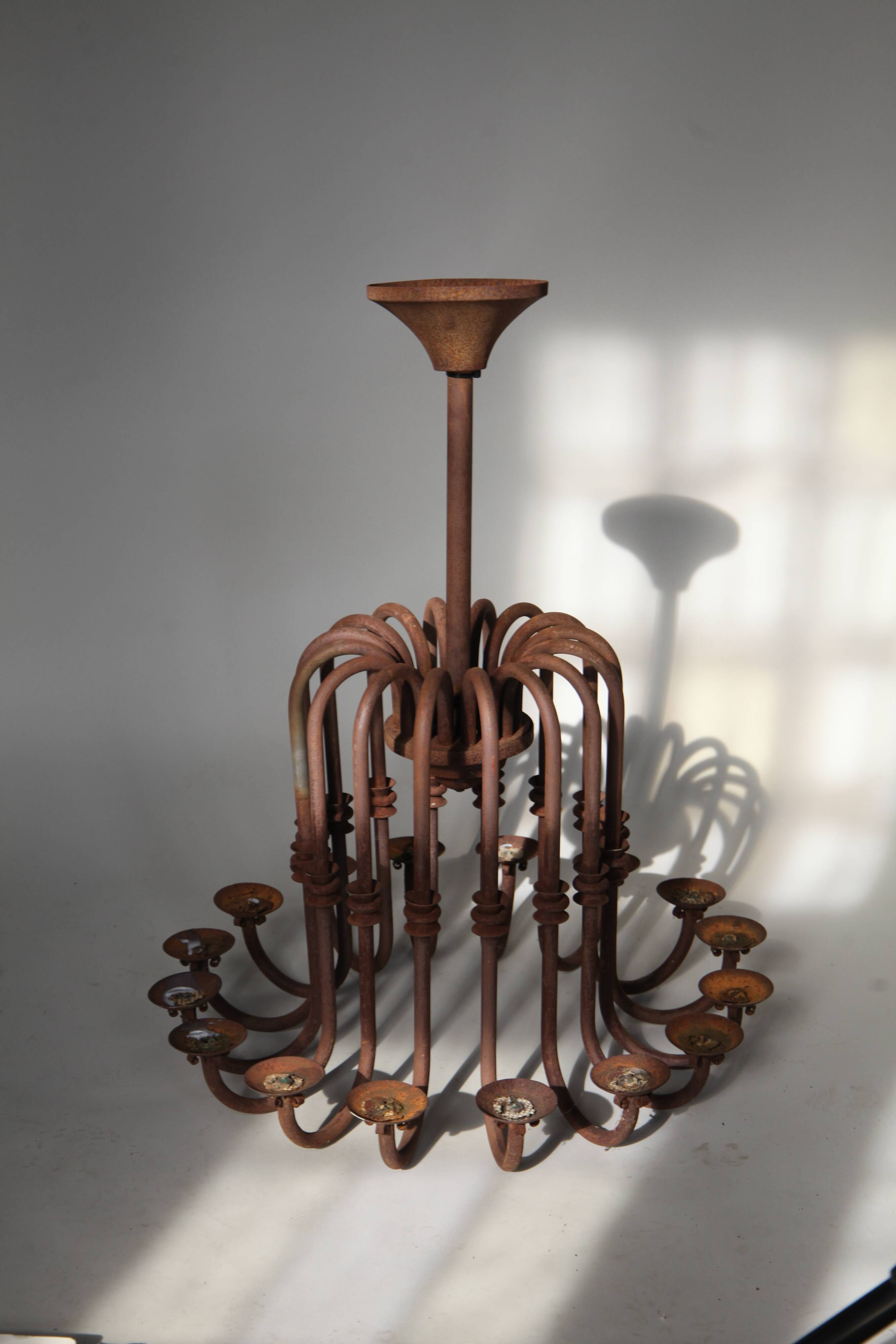 Large antique chandelier with 16 light arms