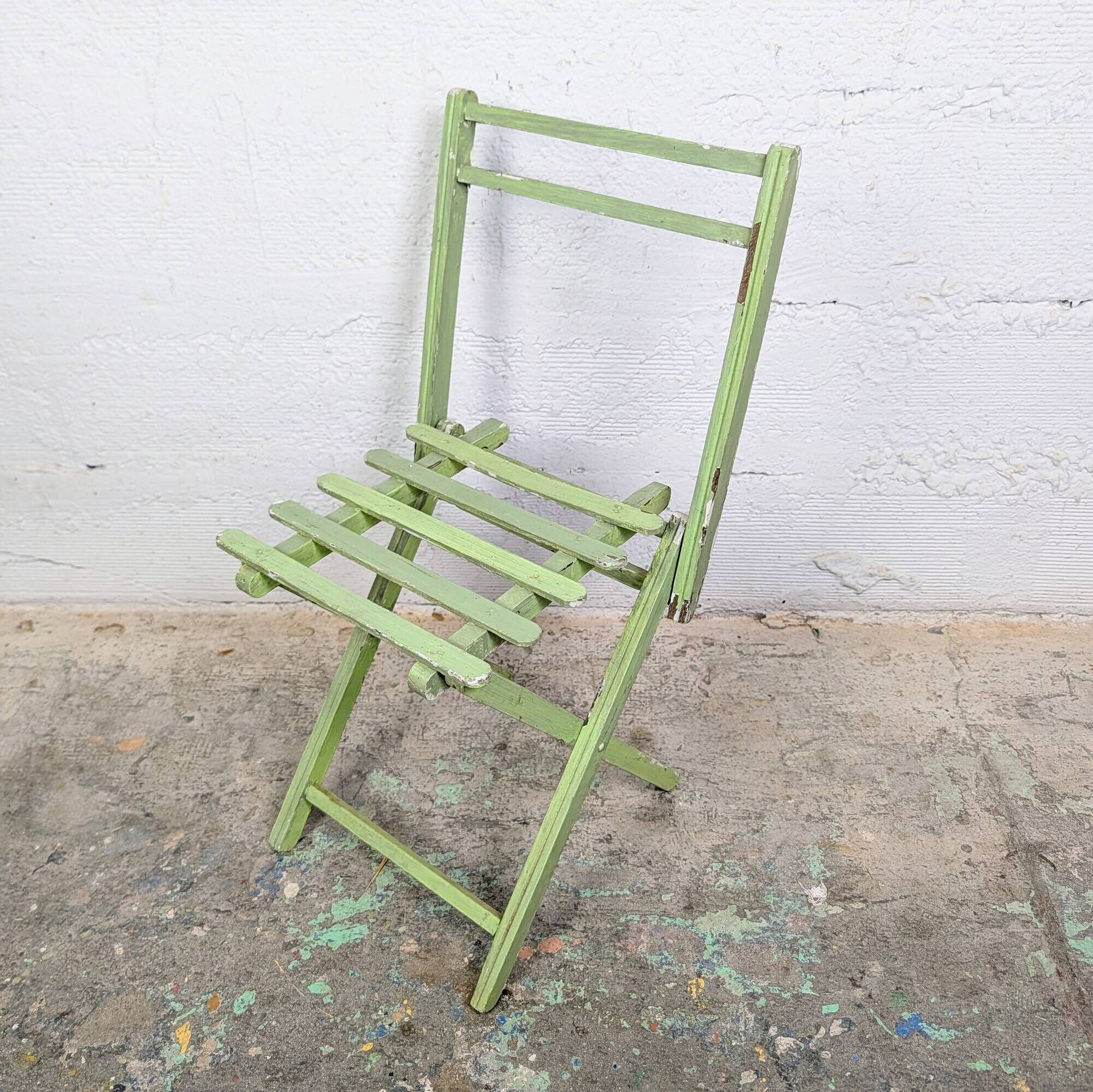 Child's folding chair in patinated green wood
