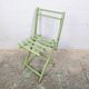 Child's folding chair in patinated green wood