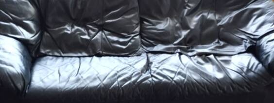 Gerard Guermonprez black leather sofa, cocooning sofa