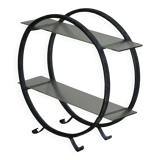 Decorative shelf unit, round metal frames with curved legs and glass shelves, 1960.