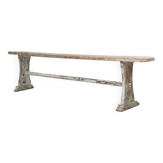 Beautifully crafted industrial bench with a wooden top and white paint, France ca. 1900