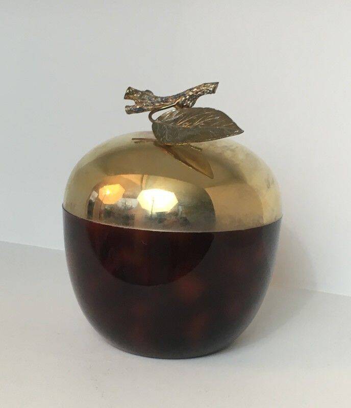 Apple-shaped ice bucket in red celluloid, gold-tone metal and plastic