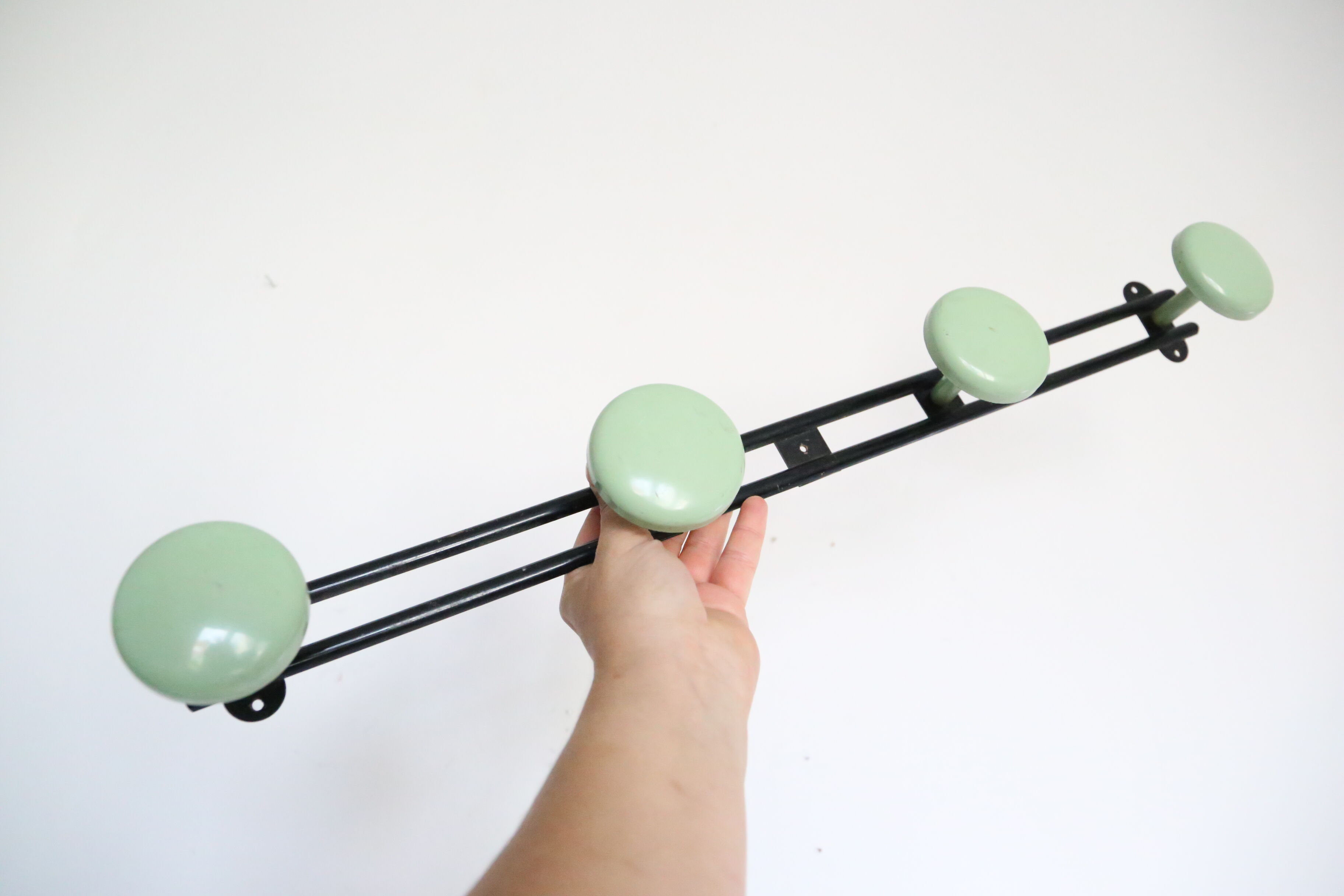 Metal, green and black, vintage wall coat holder