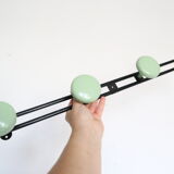 Metal, green and black, vintage wall coat holder