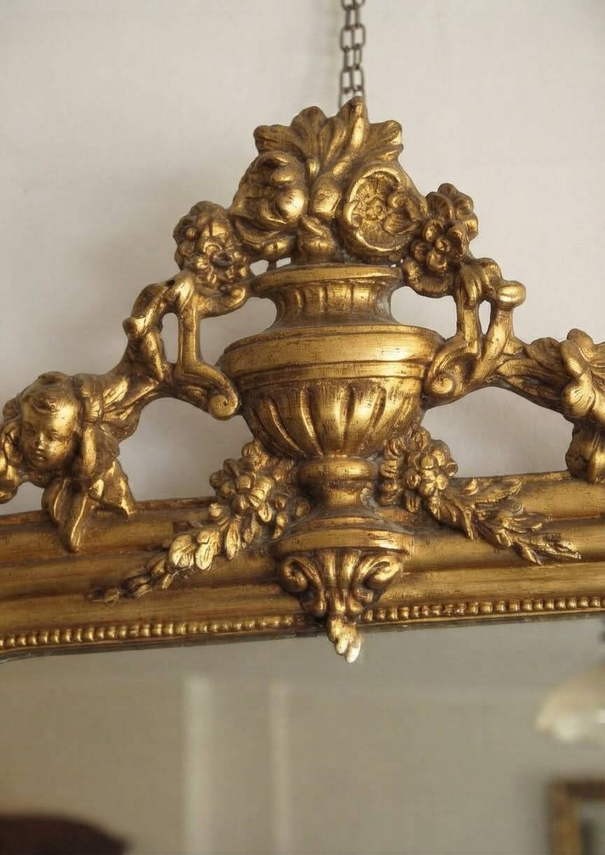 Gold wall mirror from the early 20th century.