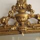 Gold wall mirror from the early 20th century.