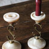 Pair of curved brass candlesticks with onyx