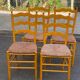 4 solid wood chairs with rush seats from the 1960s.