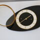 Horloge triangulaire formica noir