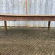 Antique farmhouse table in solid oak with tapered legs and 1 drawer at the end.