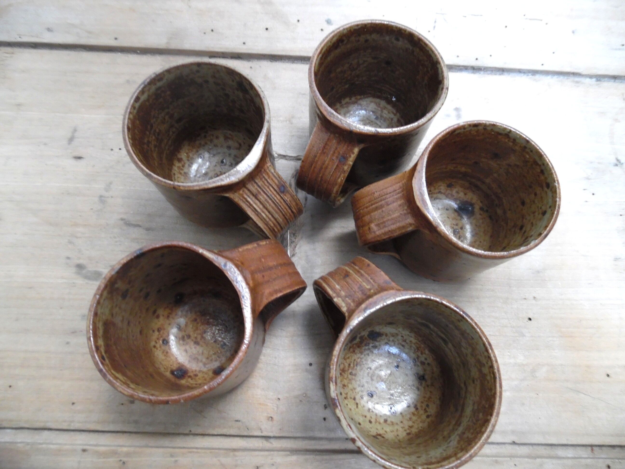 Five cups in stoneware