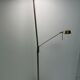 Golden metal floor lamp with reading light