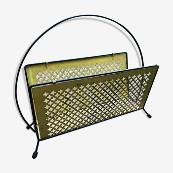 Magazine holders of 50 years in yellow perforated metal