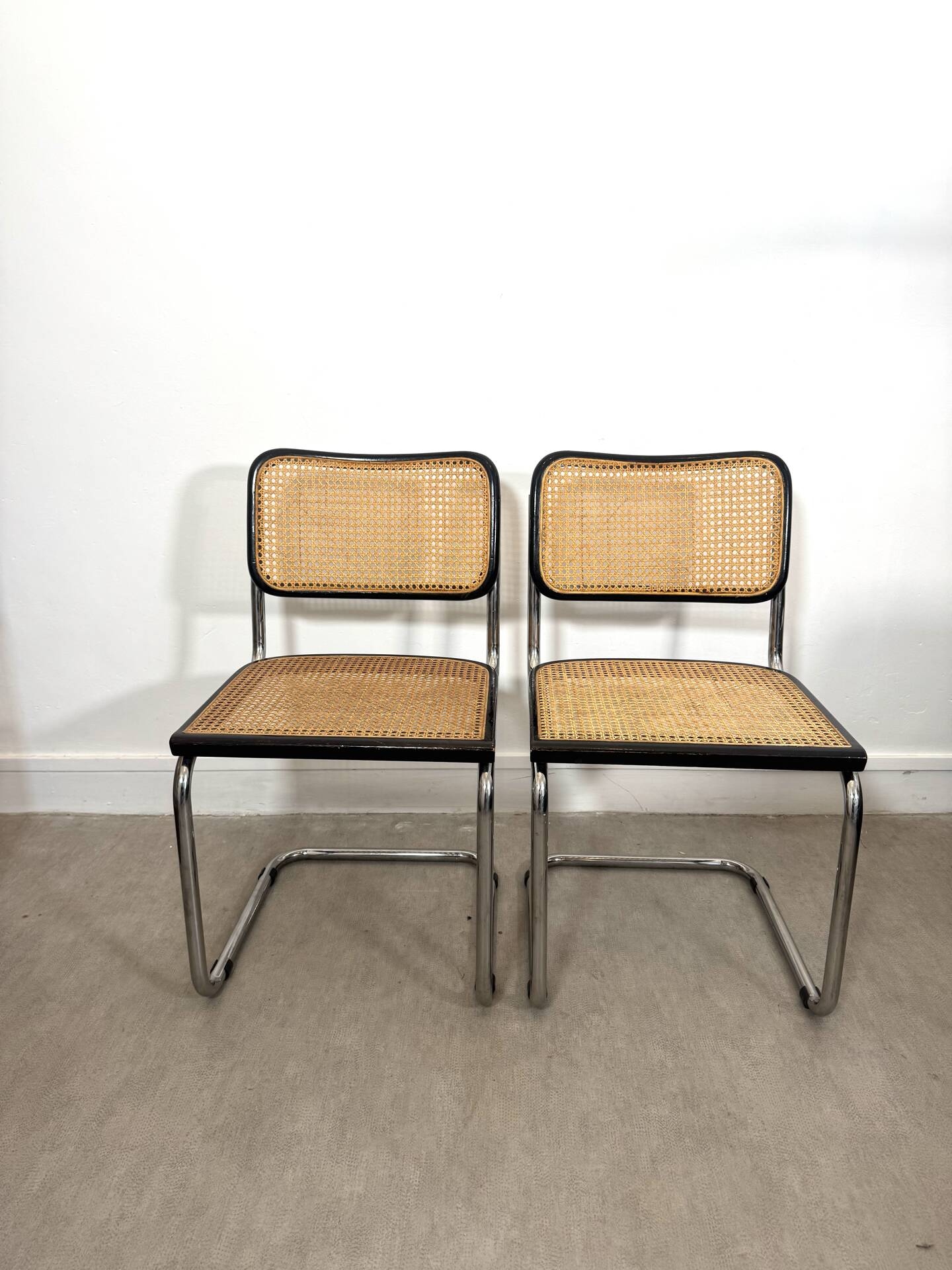 Pair of Marcel Breuer B32 Cesca chairs made in Italy.
