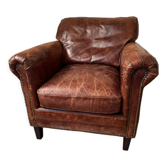 Brown leather armchair