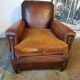 Old studded leather club chair 1930-1930