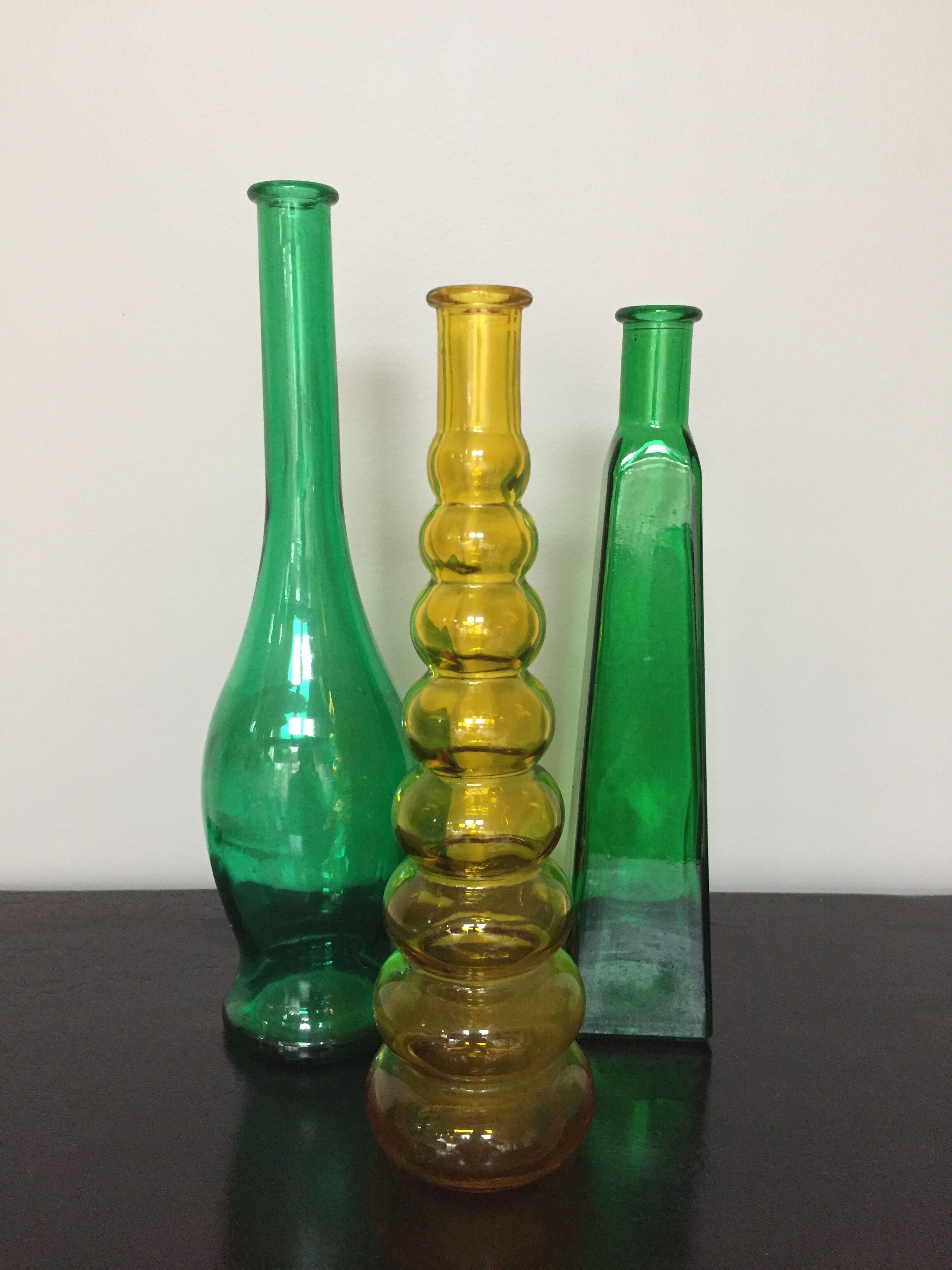 Series of 3 green and yellow glass vases