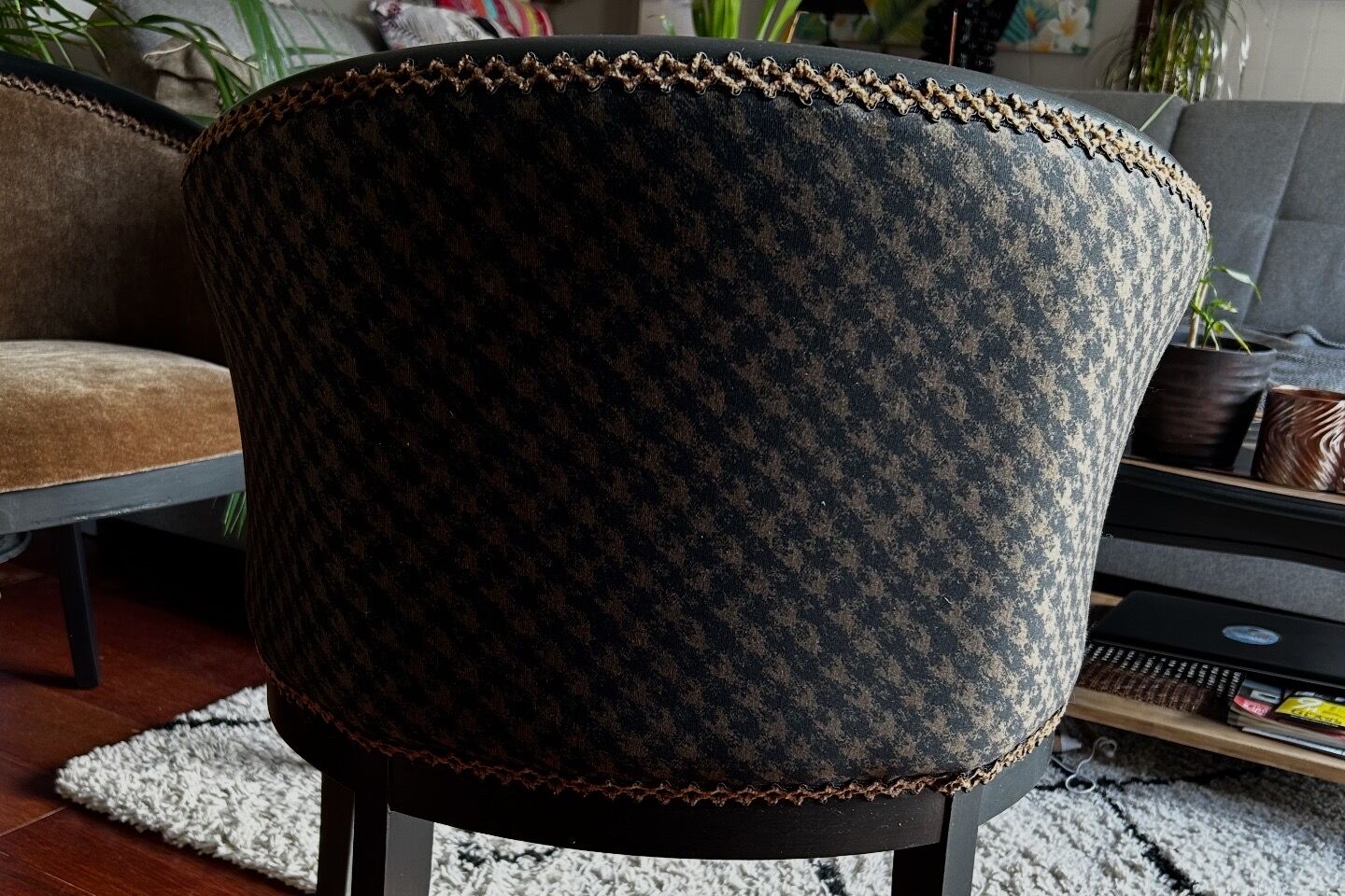 Pair of Art Deco barrel chairs in black and bronze