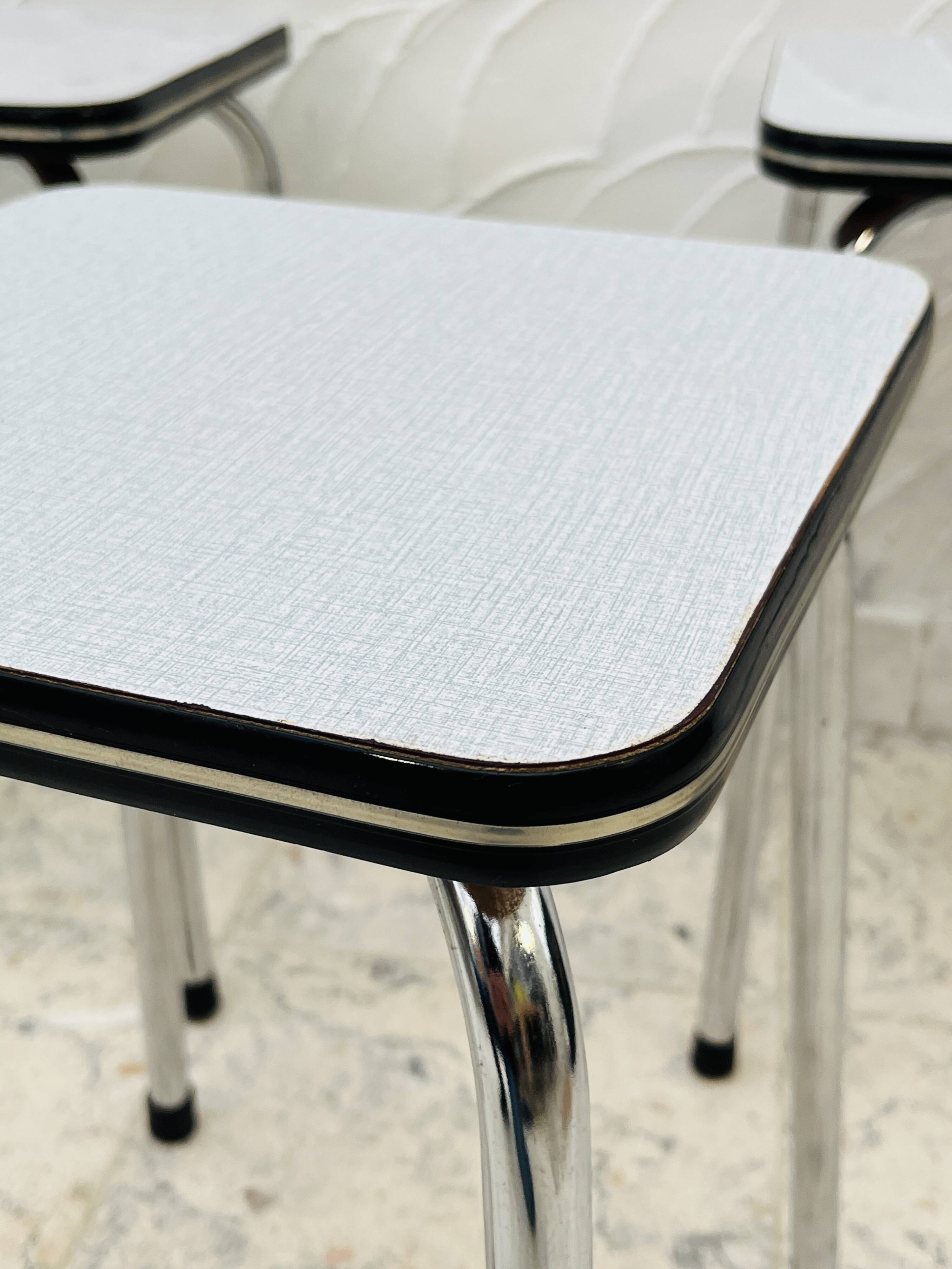 Set of 4 vintage grey chrome Formica stools.