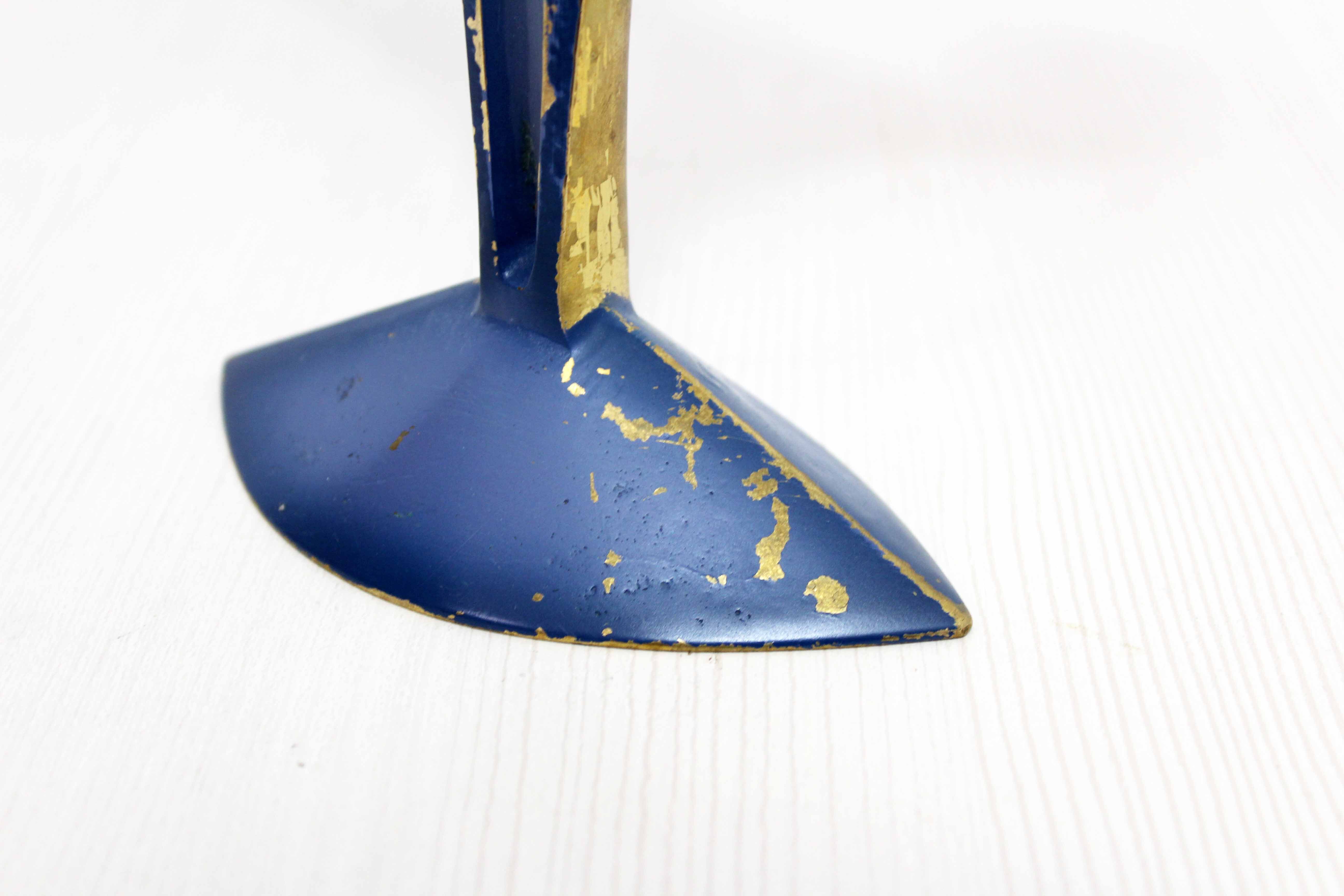 Modernist bronze candle holder