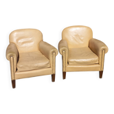 Pair of 1930s club armchairs in ivory leather.