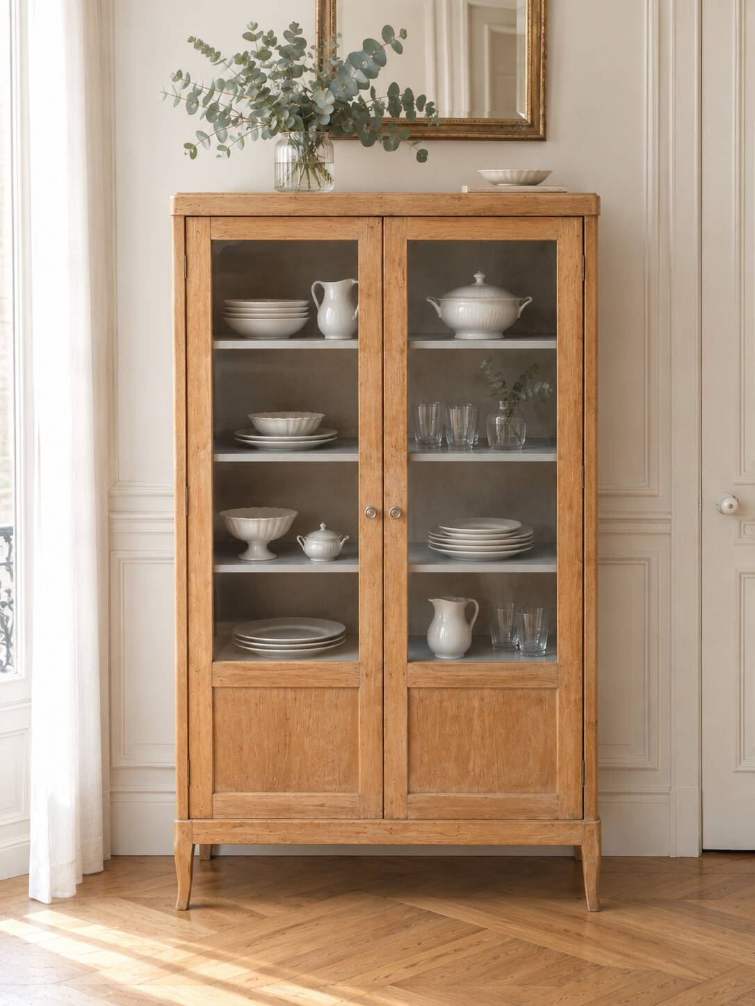 Charming vintage display cabinet from the 1950s in natural wood.