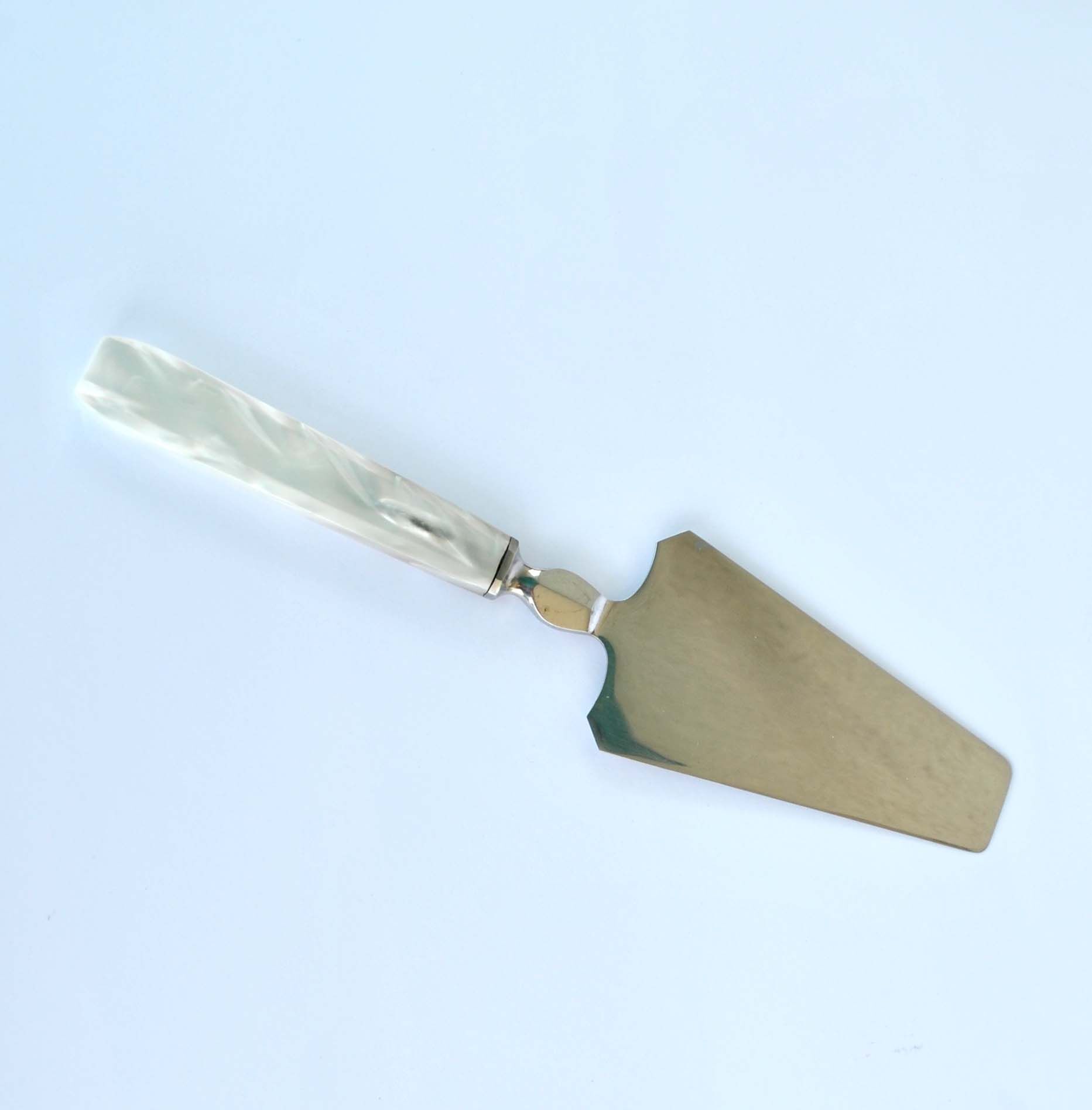 Vintage pie shovel by Streisguth in stainless steel and pearly resin handle