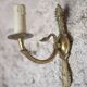 Pair of Empire style bronze wall lights, bronze wall light with palmette and swan neck.