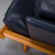 Danish teak and navy blue leather 2-seater sofa from Komfort, 1970s