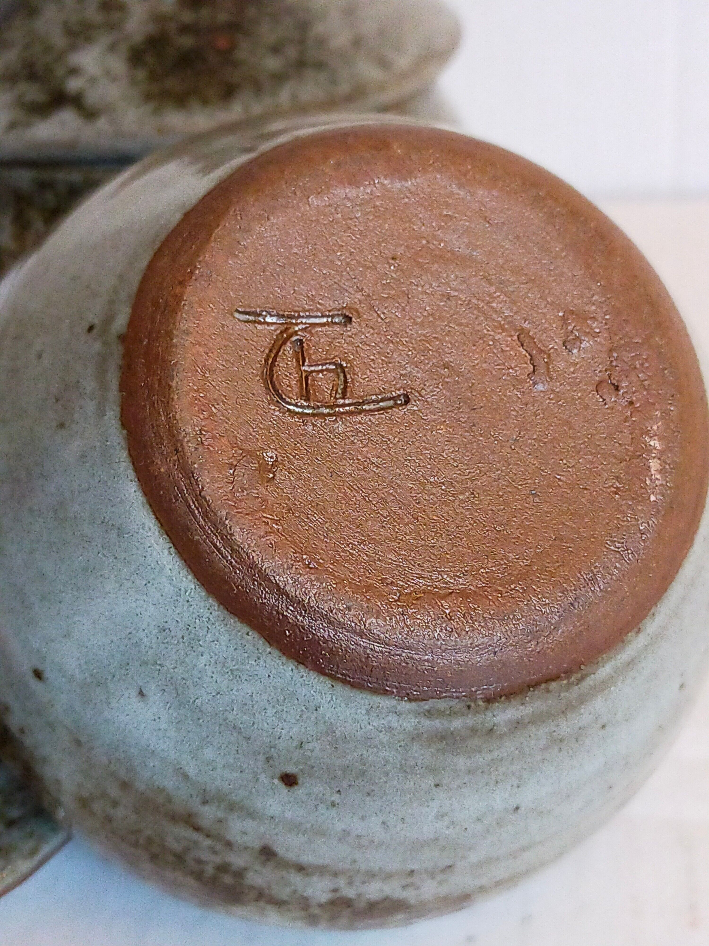 Duo of potter's pots covered in vintage glazed stoneware