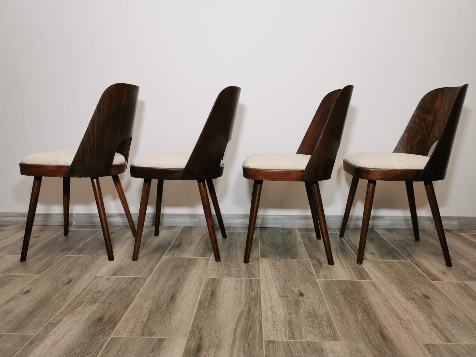 Dining chairs by Oswald Haerdtl