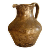 Old solid metal pitcher