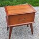 Vintage bedside table with compass legs from the 50s