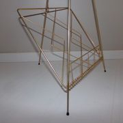 Vintage magazine holder in gold metal