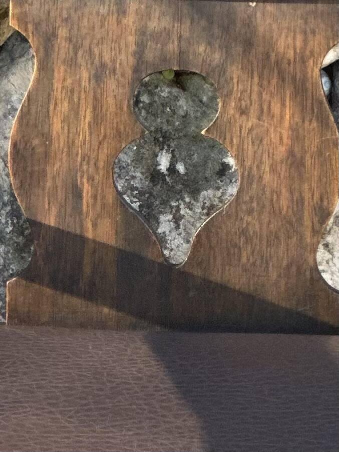 Pair of armchairs in stained wood and leather, 20th century