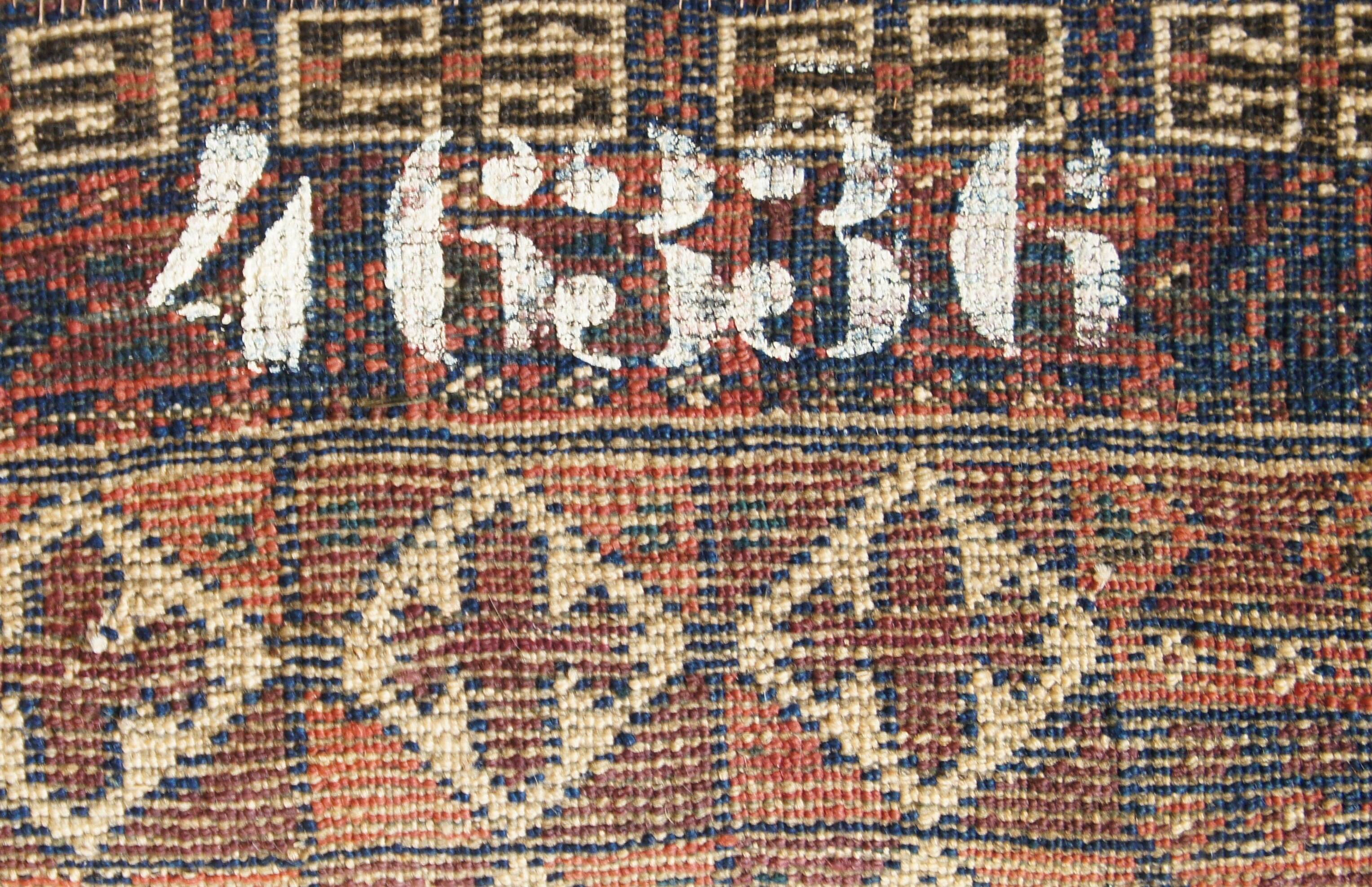 Old numbered hand-knotted rug