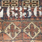 Tapis ancien noué main numéroté