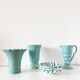 Vintage ceramic ribbed corolla vase