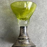 Set of 5 coloured stemmed glasses on silver stems.