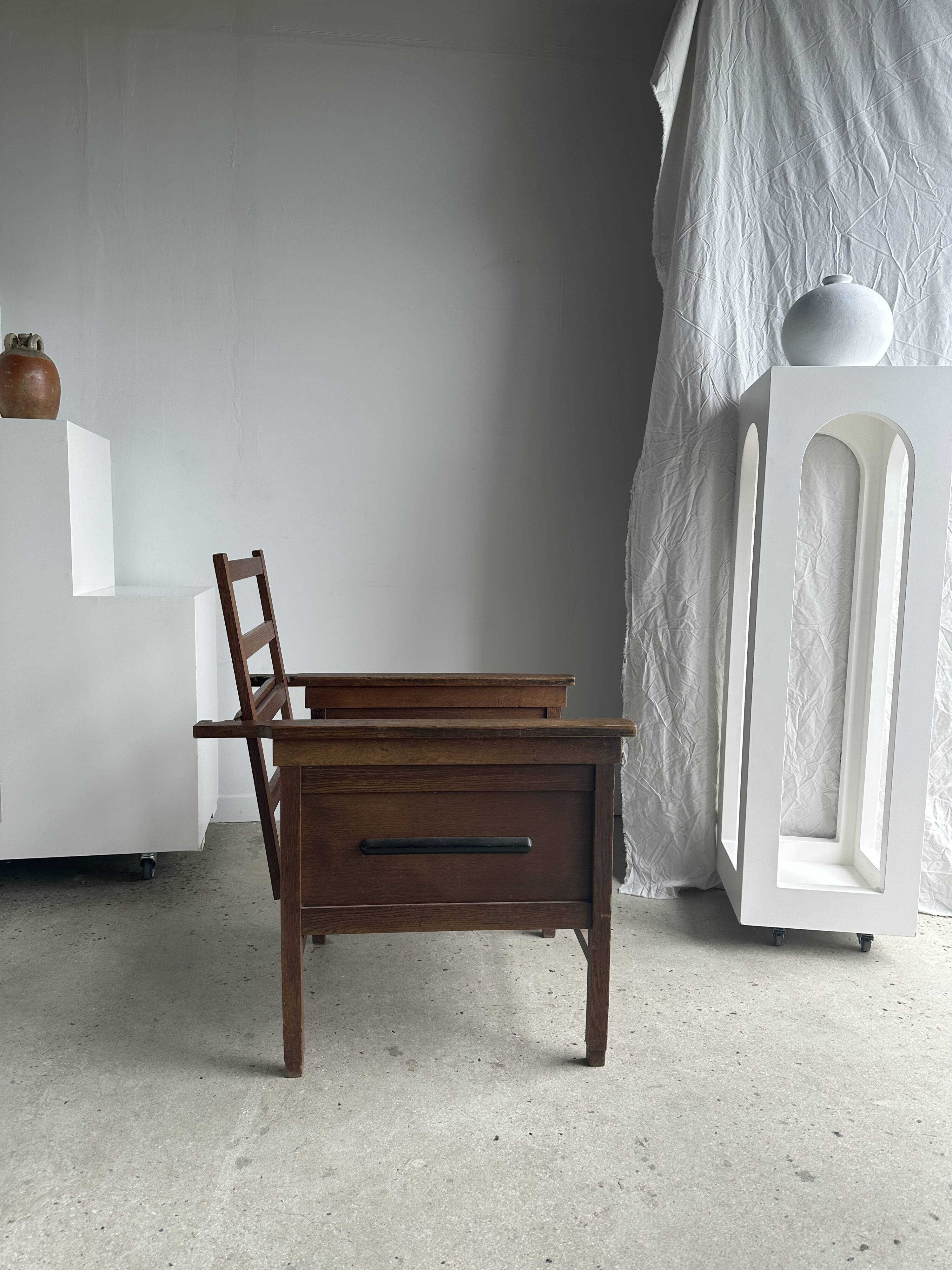 Large wooden armchair with adjustable reclining back