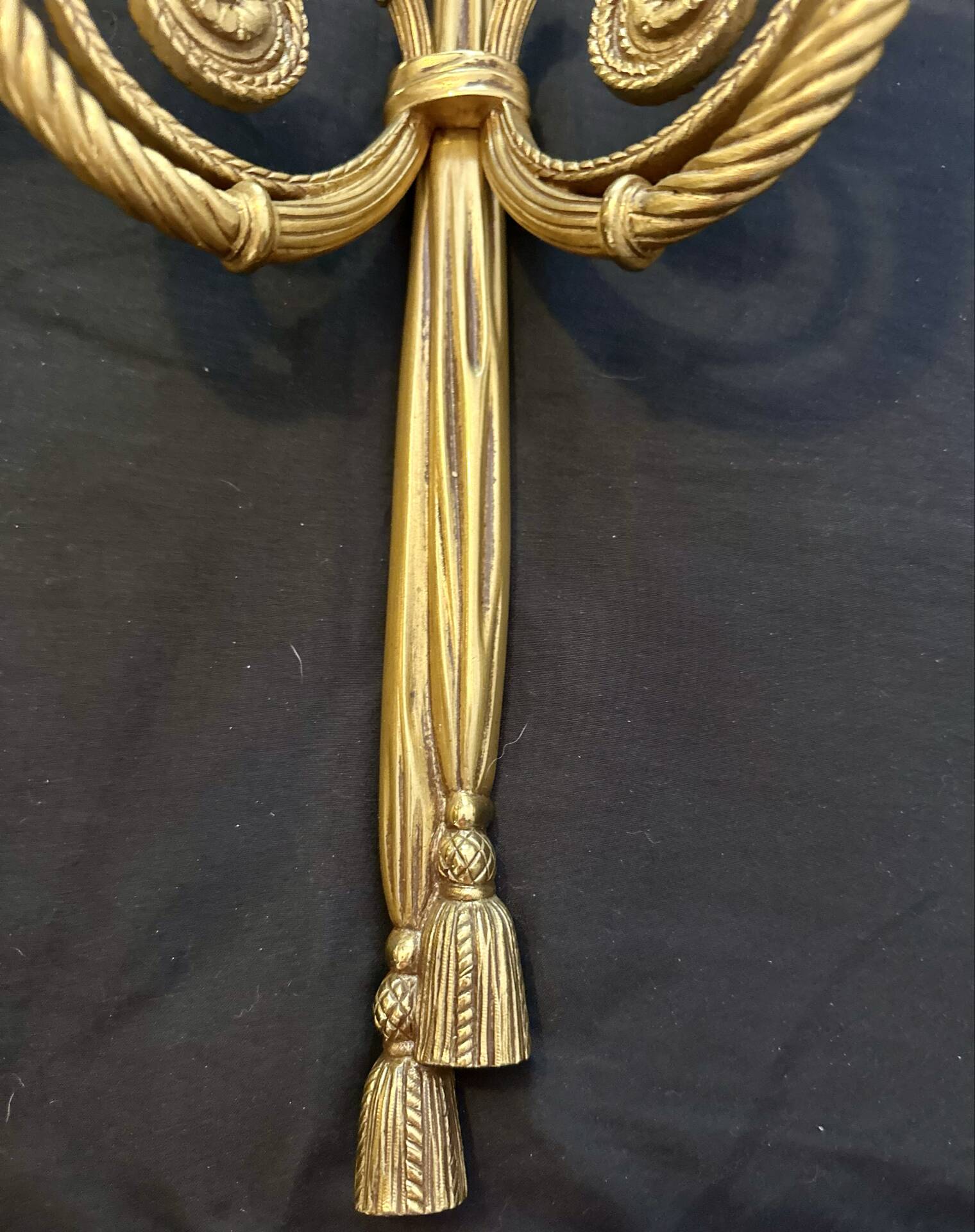 Pair of gilded bronze wall sconces in the Louis XVI style. 20th century.