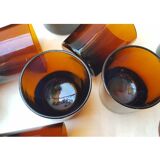 11 amber-coloured glasses