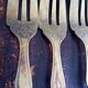 9 brass cake forks - vintage Bakelite handle